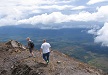 men walking on the summit of izalco